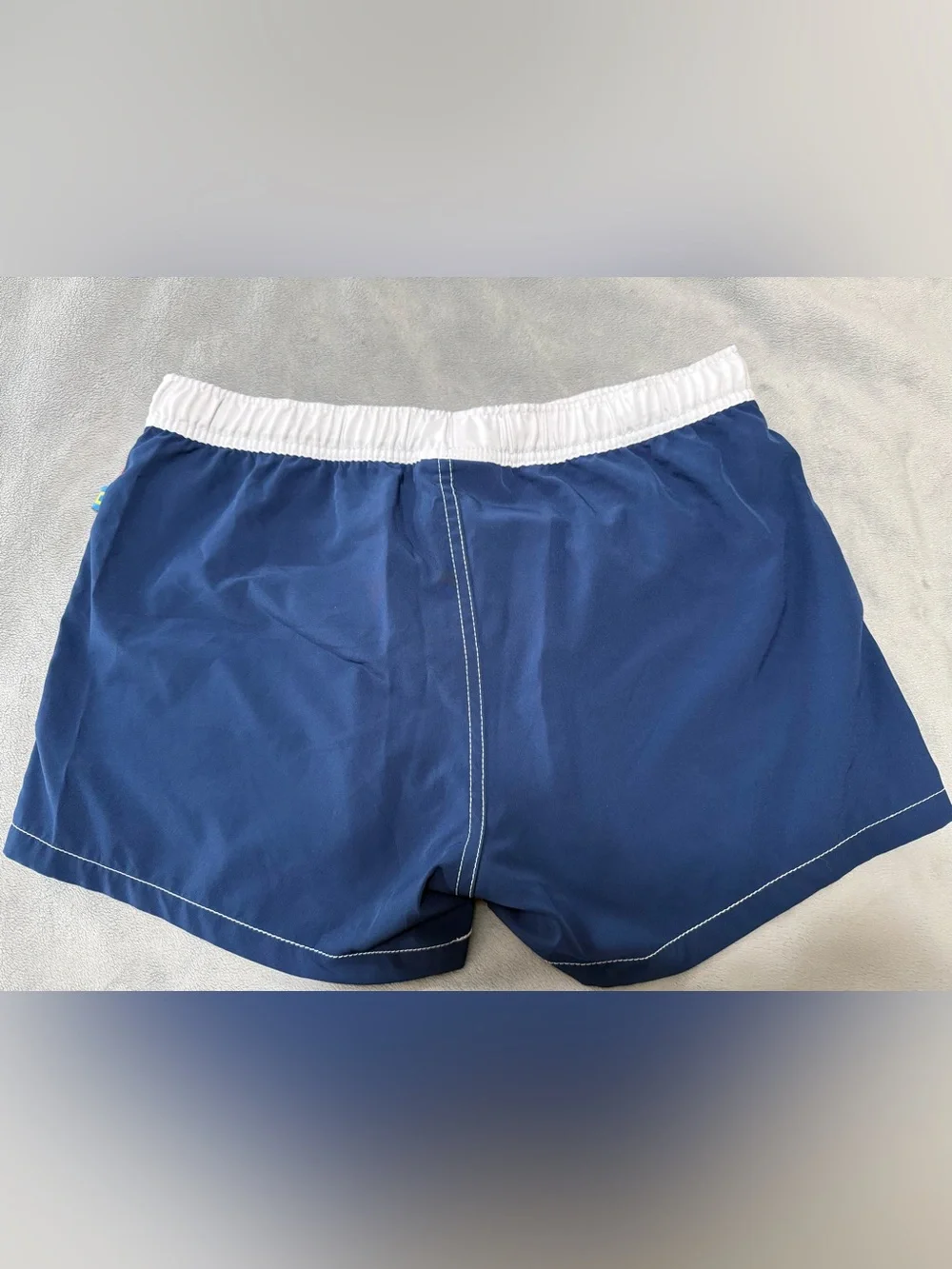 Andrew Christian lined swim trunks. They are a men’s large.